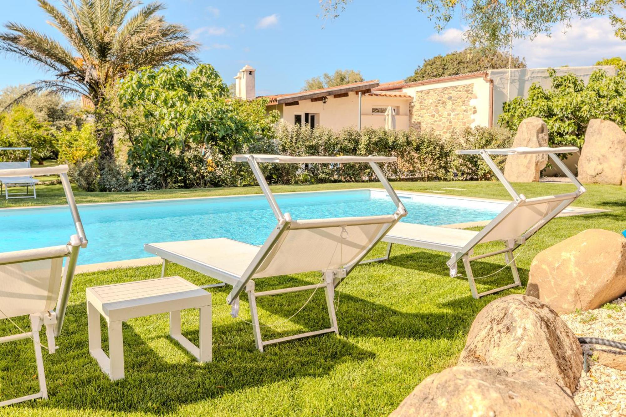 Stazzo San Teodoro L'Olivastro Piscina Condivisa Apartment Exterior foto